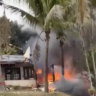 This frame grab from UGC video provided by Felipe Magalhaes Filho shows fire coming from a plane that crashed by a home in Vinhedo, Sao Paulo state, Brazil, Friday, Aug. 9, 2024. (Felipe Magalhaes Filho via AP)