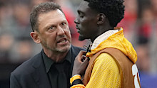 Tony Popovic talks to Mohamed Toure.