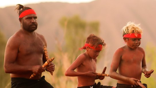 The Indigenous community celebrates the closure of the Uluru climb in October.