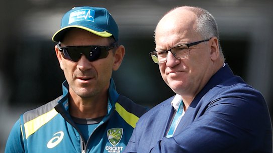 Justin Langer with Cricket Australia chairman Earl Eddings (right).