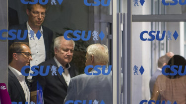 German Interior Minister Horst Seehofer, third left, is pictured during a board meeting of his Christian Social Union CSU in Munich, southern Germany, on Sunday night.
