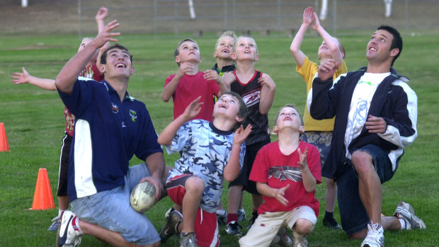 Sean Maloney among the Rams under-8s alongside Terry Campese (left) and Lincoln Withers (right) 