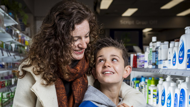 Nickie Williams with son Oliver at the Westgarth Pharmacy, Northcote. The mother welcomes the changes.