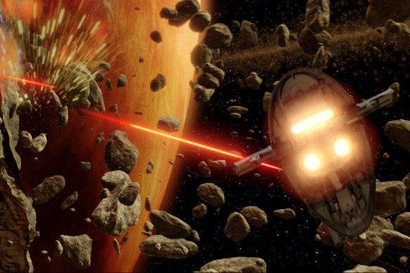 Jango Fett's Slave I fires its laser cannons at Obi-Wan Kenobi's Jedi starfighter in a scene from Star Wars Episode II: Attack of the Clones.