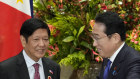 Japan’s Prime Minister Fumio Kishida, right, greets Philippines President Ferdinand Marcos jnr in December 2023.