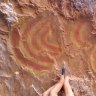 'Spine-tingling' Indigenous rock art saved from destruction