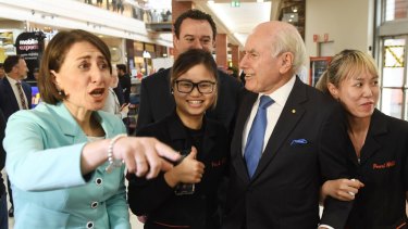 NSW Premier Gladys Berejiklian is joined by former prime minister John Howard as they take to streets in Penrith on Monday.
