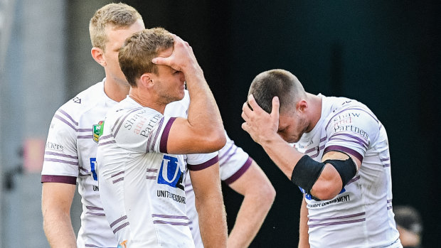 Daly Cherry-Evans (left) for the Sea Eagles reacts after another Eels try in round seven.