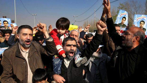 Iranian worshippers chant slogans during a rally against anti-government protesters after a Friday prayer ceremony in Tehran in 2018.