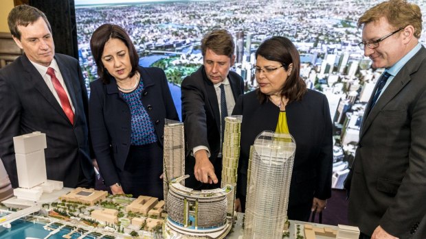 (From left) former MP Anthony Lynham, Premier Annastacia Palaszczuk, then-chief executive of Echo Entertainment (Star) Matthew Bekier, MP Grace Grace and former Echo Entertainment Queensland director Geoff Hogg look at a model of the Queen’s Wharf Brisbane development in 2015.