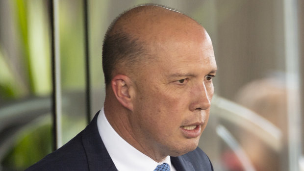Peter Dutton leaves a Canberra hotel after losing the leadership spill to Scott Morrison.