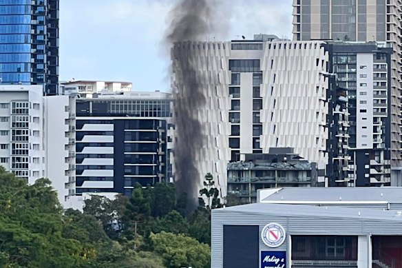 Fire is seen rising from Musgrave Park early on Thursday, in this photo posted by John Souza to the Facebook page Keep West End Weird.
