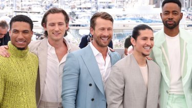 Tom Cruise in ‘Top Gun: Maverick’; The cast of ‘Top Gun: Maverick’ (L to R) Greg Tarzan Davis, Lewis Pullman, Glen Powell, Danny Ramirez, Jay Ellis, Jon Hamm and Miles Teller, give men’s fashion a reboot on the ground at the Cannes press call for the eagerly-awaited sequel.