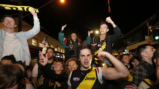 Richmond fans celebrate in Swan Street after the 2019 AFL grand final.