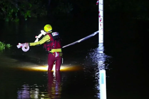 Man rescued from floodwaters by his hair