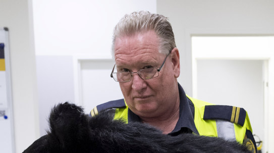 An Australian Border Force official holds up the bear that they seized in September. 