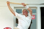 Warne celebrates on the Trent Bridge balcony after victory over England in the Fifth Test in 1997.