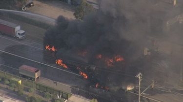 Trucks on fire in Sydney’s west after an accident.