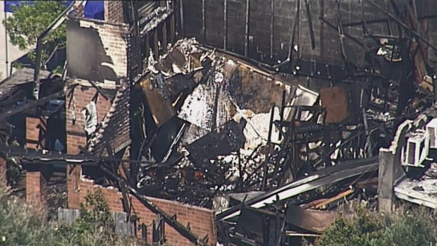 The townhouse fire at Myola Street in the Logan suburb of Browns Plains that killed Langham and Hely.