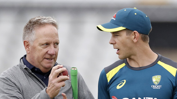 Former Australian wicketkeeper Ian Healy talks tactics with Tim Paine at Old Trafford.