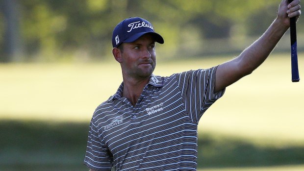 Signing off: Webb Simpson reacts after his eagle on the 18th hole during the second round in Boston.