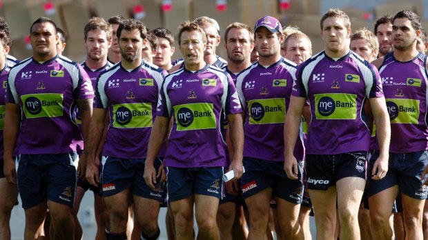 Defiant: Storm players and coach Craig Bellamy front Melbourne's salary cap scandal in 2010.