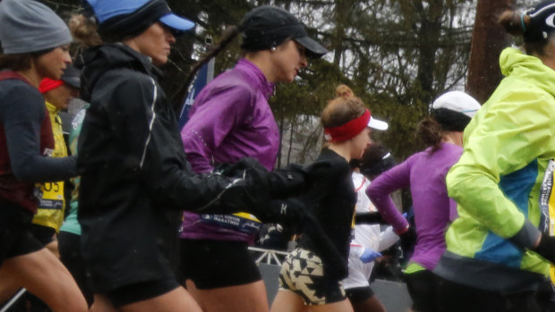 Sarah Sellers (centre in purple with black cap), during the early stages of the Boston Marathon.