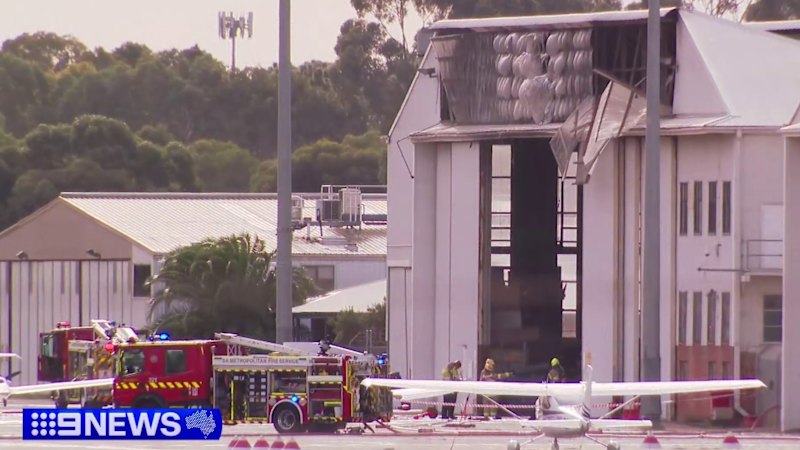 Two dead, 10 hurt as plane crashes into hangar near Adelaide