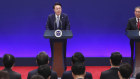 South Korean President Yoon Suk-yeol, centre, speaks as Japanese Prime Minister Fumio Kishida, left, and Chinese Premier Li Qiang listen during a joint news conference in Seoul.