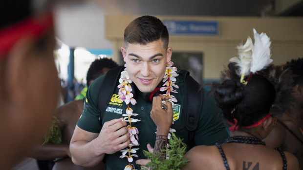 Nick Cotric arriving in Port Moresby with the PM's XIII team.
