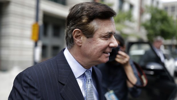 Paul Manafort exits federal court in Washington in May last year.
