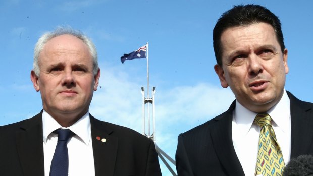 John Madigan, left, pictured with 
Nick Xenophon, who called him "a man of enormous integrity".