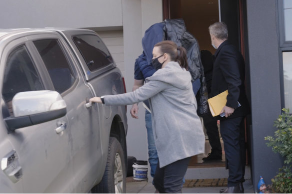 Screenshot of police arresting an individual on Wednesday as part of a sporting integrity investigation. 