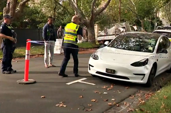 Police seize the Tesla.