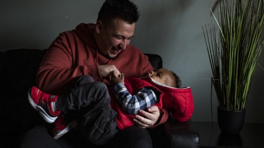 Formerly homeless youth Luis Montero with his son Andre.