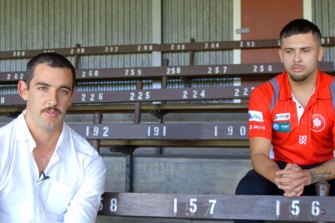 Taylor Walker alongside Robbie Young.