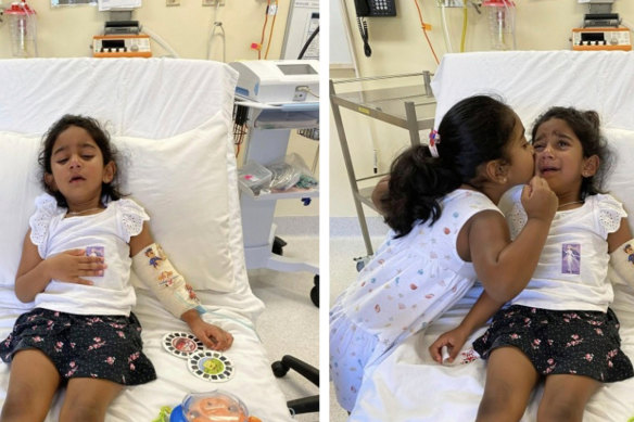 Tharnicaa and her sister Kopika in hospital on Christmas Island on Sunday, June 6.