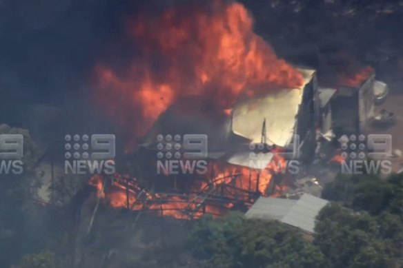 A property engulfed in flames in Parkerville. 