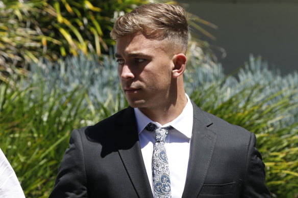 Callan Sinclair, who is facing trial over sexual assault offences, leaves Wollongong Courthouse on Tuesday.