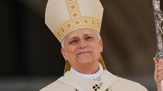 Pope Leo XIV after he received the vestments and ring of office. 