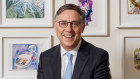 Leon Zwier in his Melbourne office. His framed mementos are an icebreaker, he says.