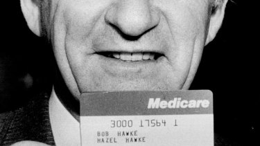 Bob Hawke in October 1983 with one of the first Medicare cards.