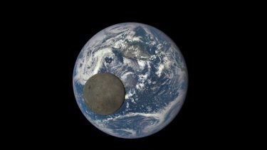 Flat as a pancake: The moon passes in front of the Earth 