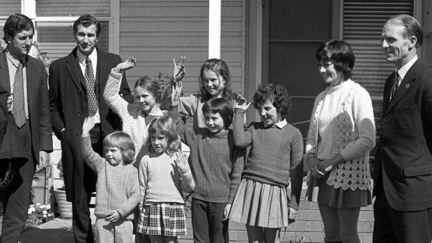 Victorian education minister Lindsay Thompson with Mary Gibbs and her six pupils after their rescue from kidnappers.  