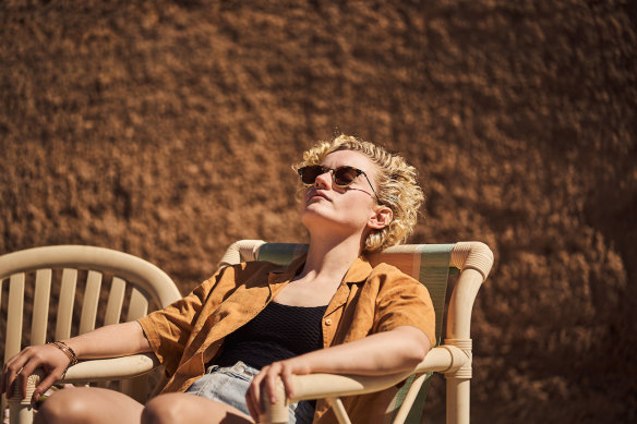 Sipping cask wine at the bottom of a disused swimming pool is about the only distraction for Julia Garner’s character.