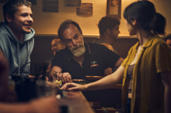 Hugo Weaving, centre, with Toby Wallace and Jessica Henwick in The Royal Hotel.