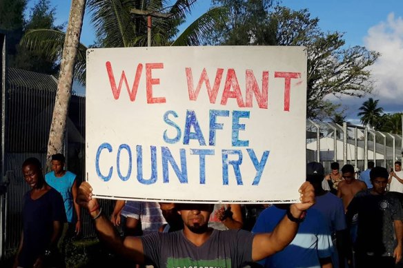 A protest by asylum seekers on Manus Island.  The islands detention centre was run by Australia until October this year when PNG took control.