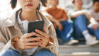 Putting mobile phones “away for the day” will encourage face-to-face social interactions, Grace Grace said.