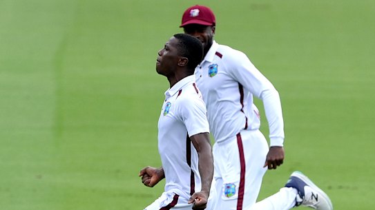Shamar Joseph celebrates the wicket of Australian captain Pat Cummins.