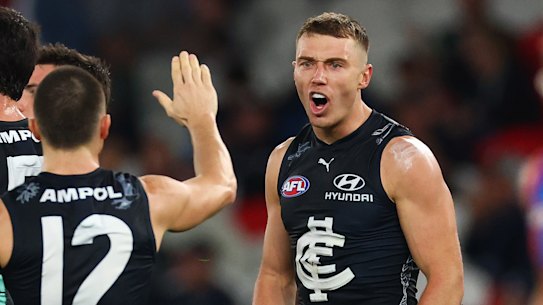 Blues captain Patrick Cripps celebrates kicking a goal against the western Bulldogs.